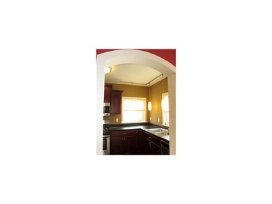 Kitchen. Arched doorway to newly redone kitchen