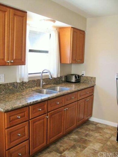 Kitchen has been recently remodeled with granite c