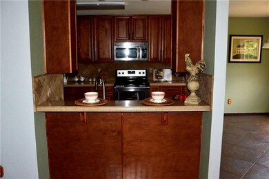 View from the Living Room looking into the Kitchen. The Dining Room is to the right.