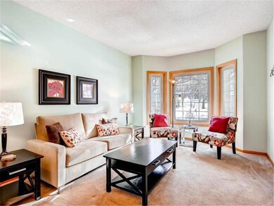 Formal living room with neutral color tones accent