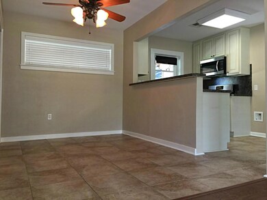 Previously a 3rd bedroom, this is now a dining are