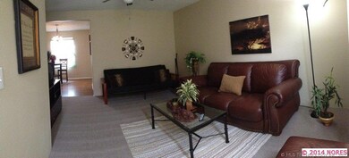 Nice living area a step up from the entry