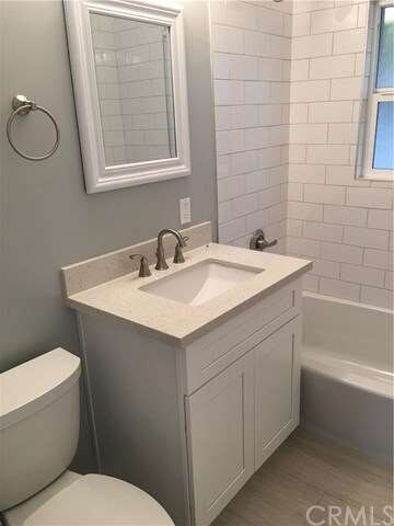 New vanity and new subway tile in the shower. New 