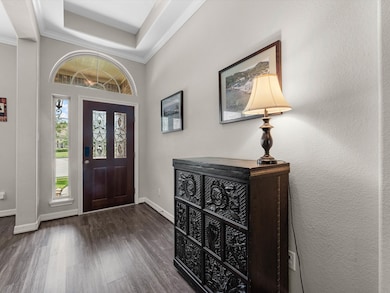Welcoming entryway featuring a a beautiful front d