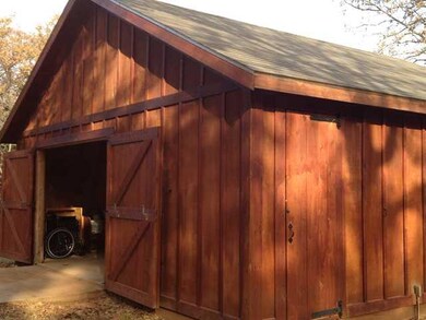 Other. Oversized 2 car garage with workbench area