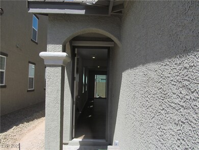 Doorway to property with stucco siding
