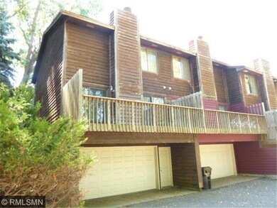 Rear view of home showing 2 car Garage and large D