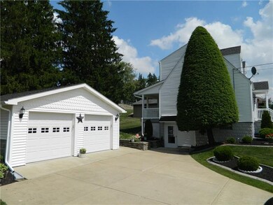 The long cement driveway allows for plenty of park