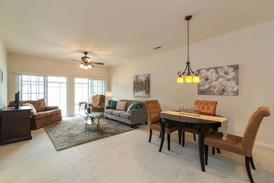 Look how large the Living and Dining areas are!  It leads to a huge patio area.