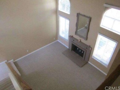 View from upstairs underscores dramatic living roo