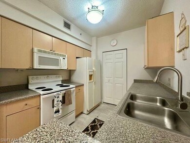 1210 Reserve Way unit 9-107, Naples, FL 34105 - photo 2