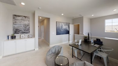 A versatile loft is situated upstairs and can easily be transformed to suit the needs of the househo