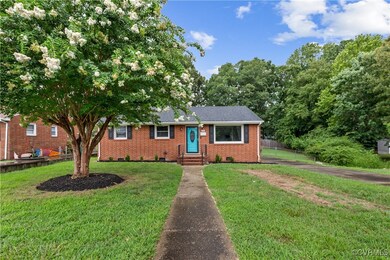 View of front of home featuring a front lawn
