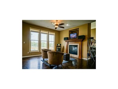 Enjoy the double-sided fireplace from the Living R