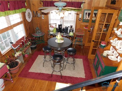 French doors lead to kitchen