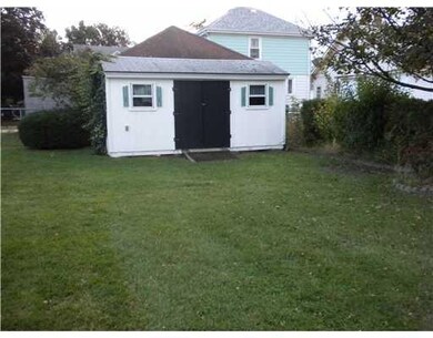 Exterior Back. Large shed for yard tools & storage