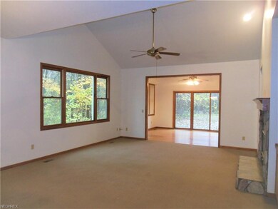 Living Rm w/ vaulted ceiling offers a cozy Stone F