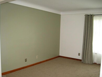 Living Rm accent wall adds style and warmth.