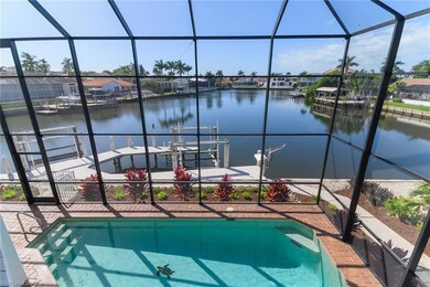 Outdoor pool with a sunroom, a lanai, and a water view