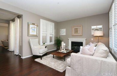 Formal living room with fireplace and plantation s