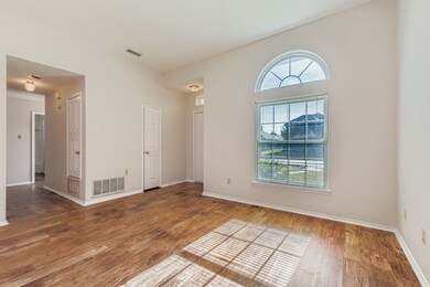Unfurnished room with wood finished floors