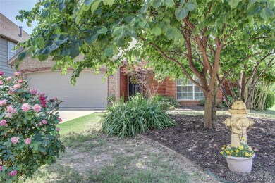 Professional Landscaped flower beds with sprinkler