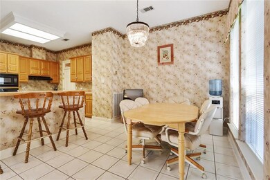 Kitchen and breakfast area with full of natural li