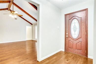 Foyer with 30-year engineered wood floors.  Beauti
