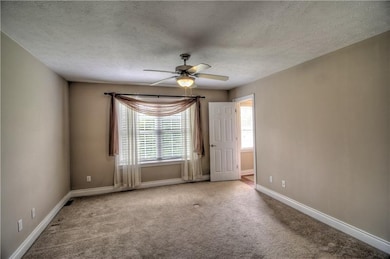 4th Bedroom features plush carpeting, custom trim 