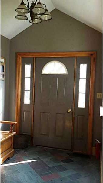 Foyer. colorful slate tile floors