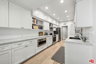 450 N Oakhurst Dr unit 101, Beverly Hills, CA 90210 - photo 6