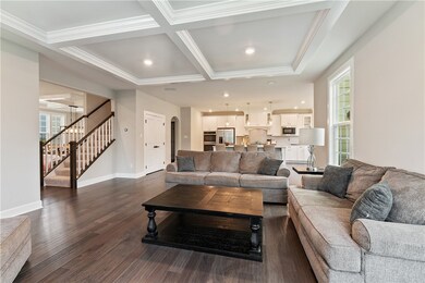 Great Room with view toward the kitchen and stairw