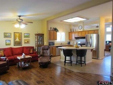 Very nice hardwood floors in the family room that 