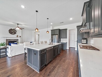 Exceptional design built for everyday life. The center island allows for the chef in the family to whip up delightful dinners. Enjoy cooking delicious meals here. Everything tastes better when it's made with love.
