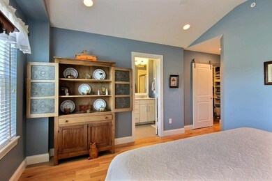 Master Suite with sliding barn-door Walk-in closet