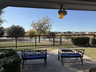 View of patio / terrace with a water view and an outdoor living space
