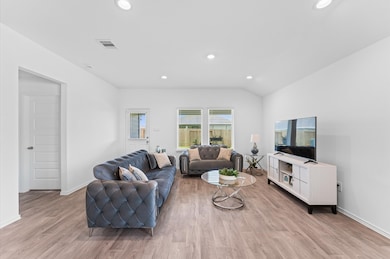 Bright and airy living room has a spacious feel.