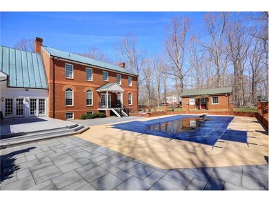 REAR VIEW OF HOME W/MAINTAINCE FREE DECK, ENCLOSED