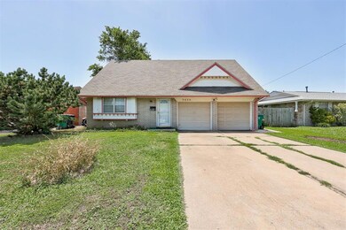 View of front of home featuring a garage and a fro