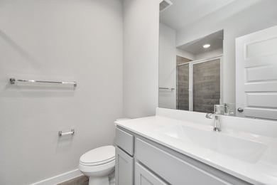 Full restroom for guest and walk-in shower with ti