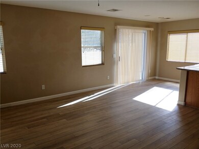 Dining area with slider to backyard