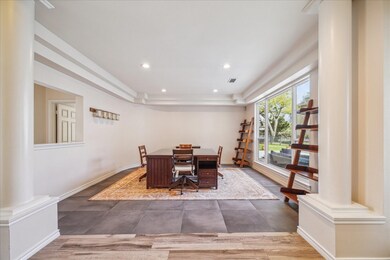 SPACIOUS FORMAL LIVING ROOM/STUDY OFFERS SLATE TIL