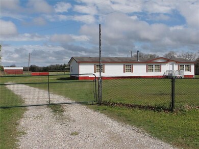 Gated Entry - Storage Building in background