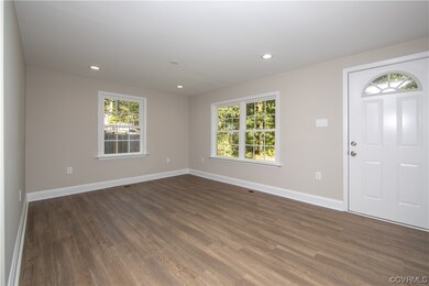 The beautiful family room offers LED lighting, LVP