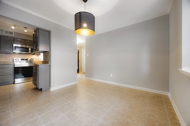 Kitchen with appliances with stainless steel finis
