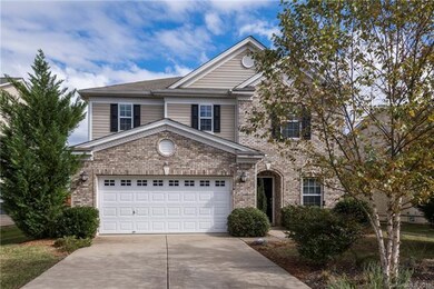 Brick front with fenced in backyard