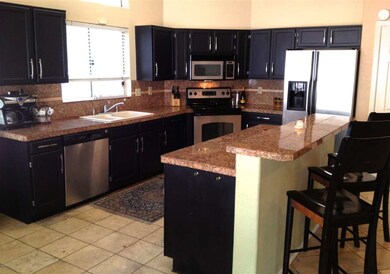 Island Kitchen with Stainless Appliances