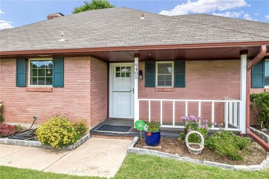 Check out the new storm door and the impressive front door....both of them...almost new!  New guttering with leaf guard!  I love the shutters!