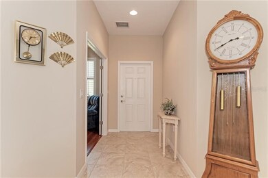 Front door entrance hallway.  Den/office to the ri