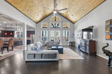 A beautiful Texas-themed leaded glass door opens f